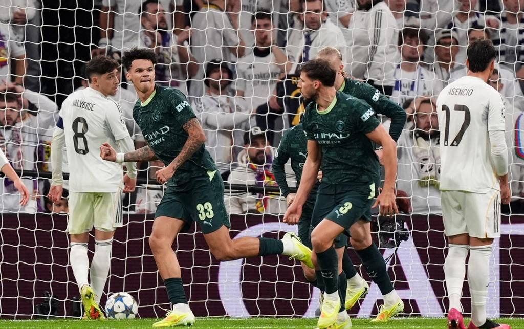 开云地址-欧冠逆转惊现！英超冠军曼城攻破伯纳乌，欧冠之王皇马失利